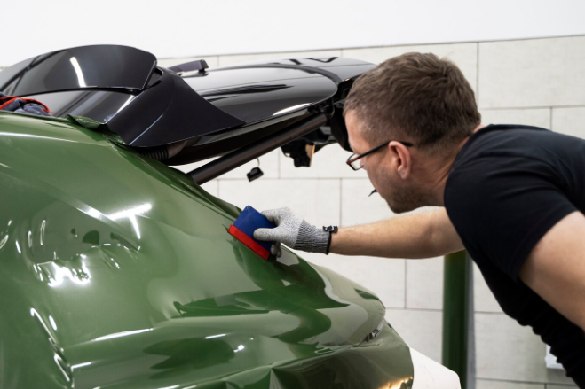 Why is Paintless Dent Repair the Best Option for Your Tesla?